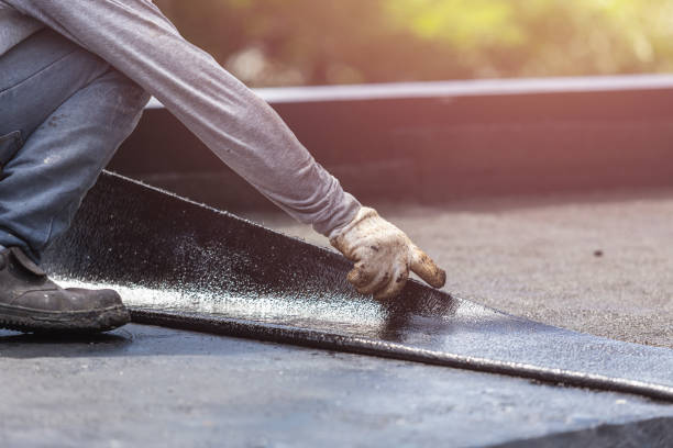 Professional Emergency Waterproofing technician working in Miller Place, NY